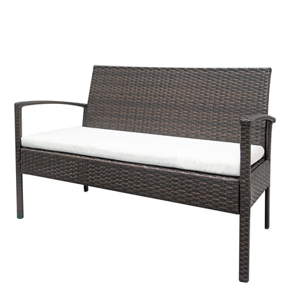 Loveseat in brown wicker rattan with off-white cushion