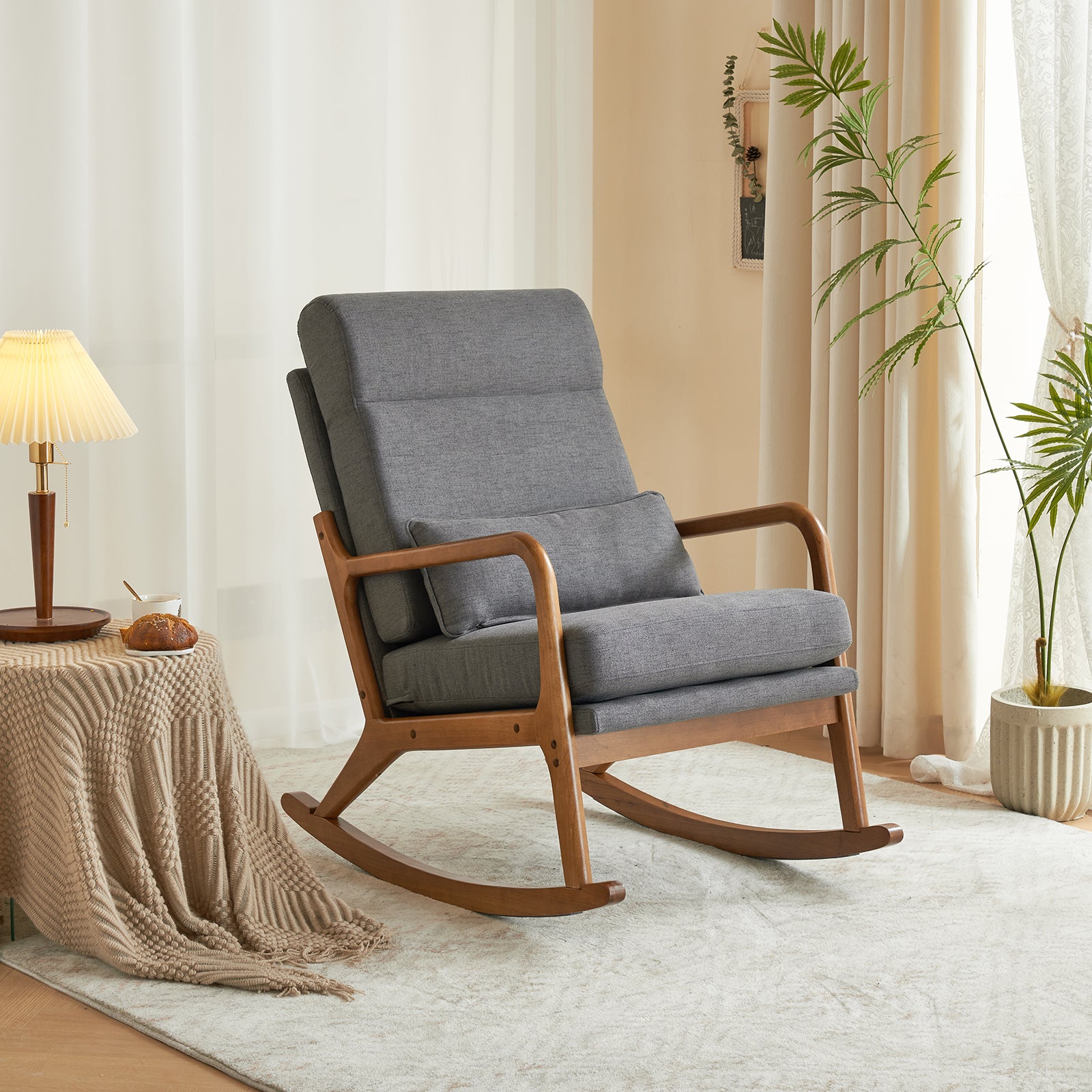 Image of the grey linen indoor rocking chair, showcasing its elegant design.