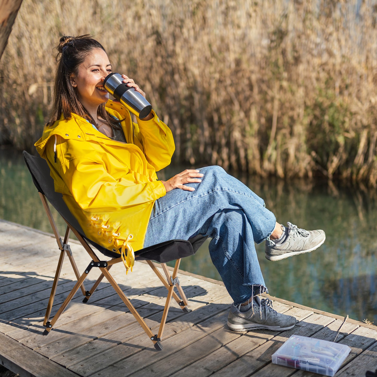 Relax in Comfort: Lady Enjoying Coffee on Lightweight Folding Picnic Chair (Black)