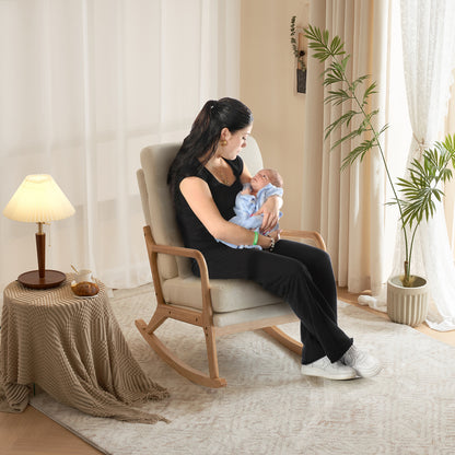 A mother enjoying the comfort of the Comfy Rocking Chair while cradling her baby, creating precious moments of bonding and relaxation.