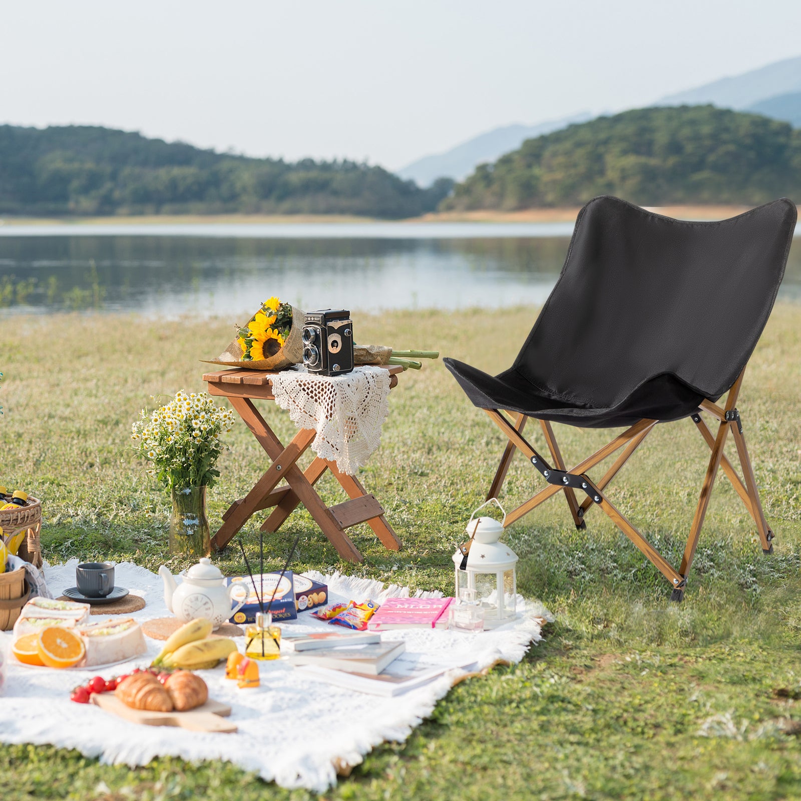 Enjoy Outdoor Gatherings: Lightweight Folding Picnic Chair (Black) at a Picnic