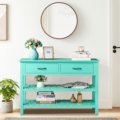 Antique blue console table with drawers in a hallway