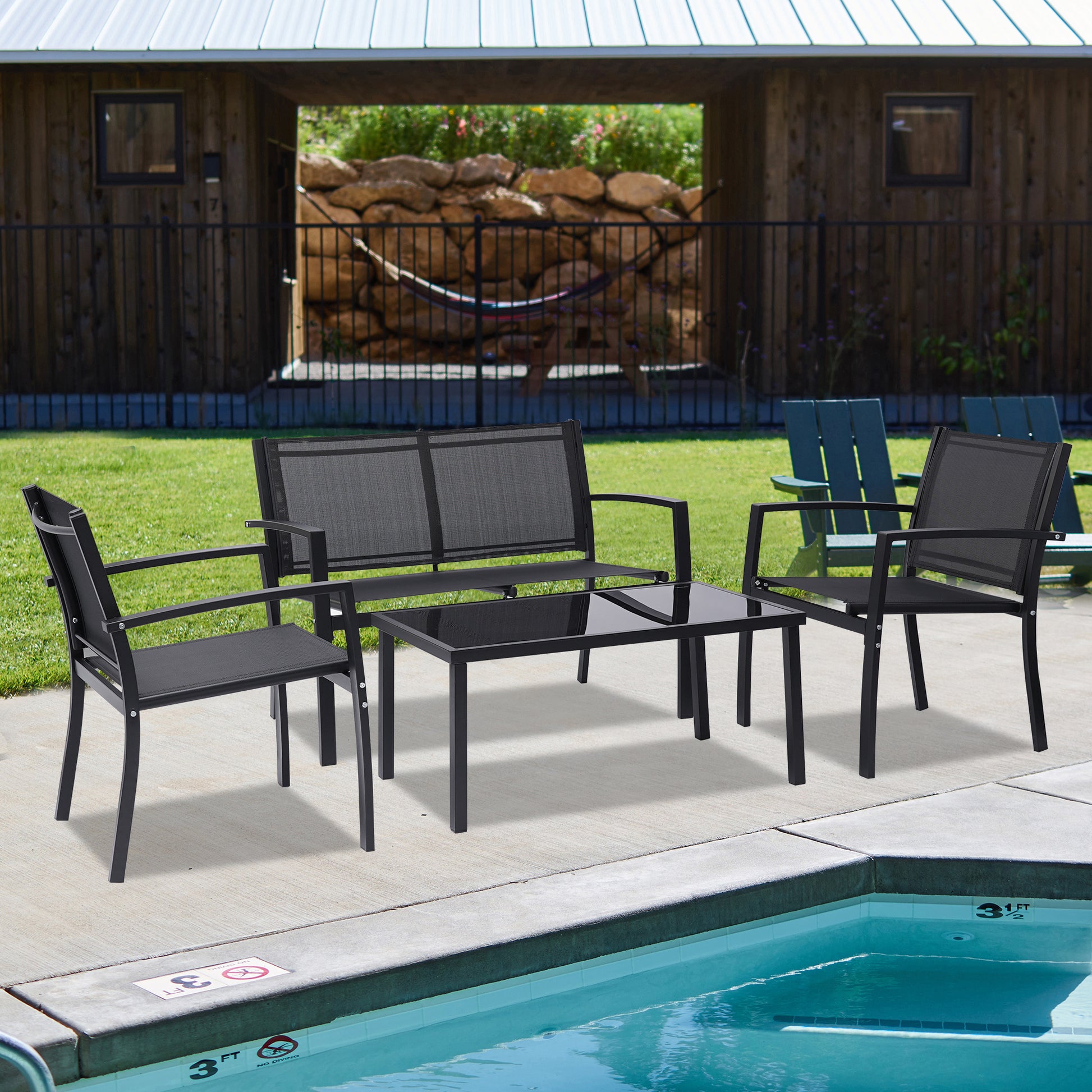 Black metal 4 person patio conversation set by the pool 