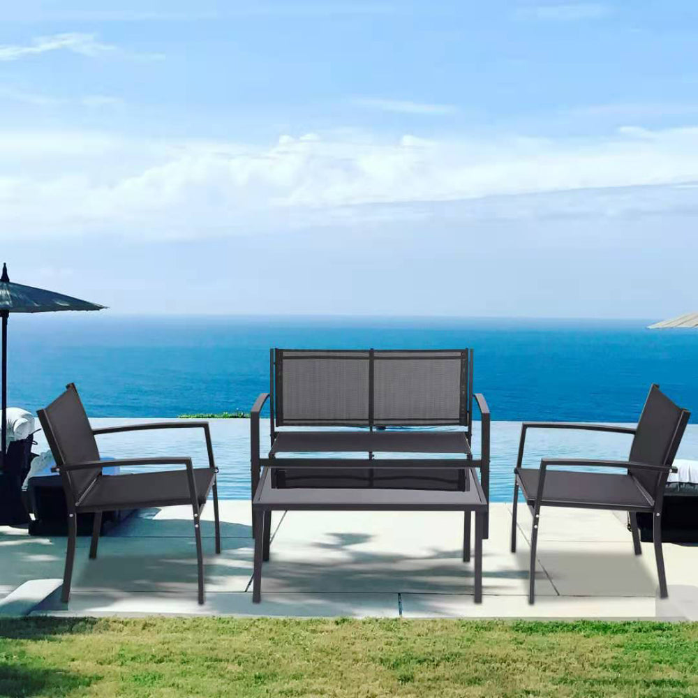 Black metal 4 person patio conversation set on a patio