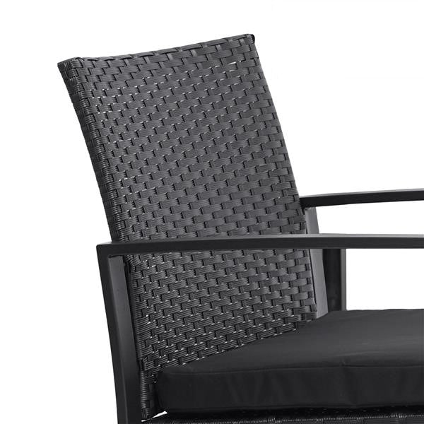 Close up of back of chair form black wicker patio bistro set