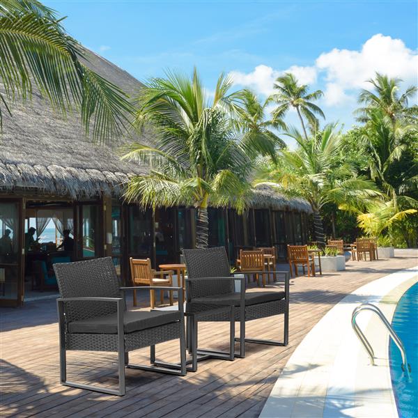 Black wicker patio bistro set on deck by the pool