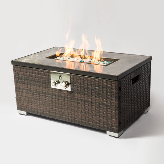 A modern gas fire pit table with electronic igniter and glass rocks, perfect for outdoor decor